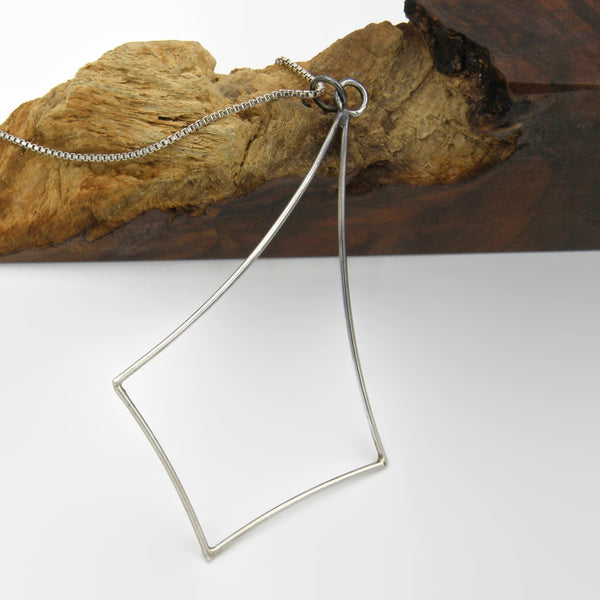 Large Negative Space Diamond Pendant