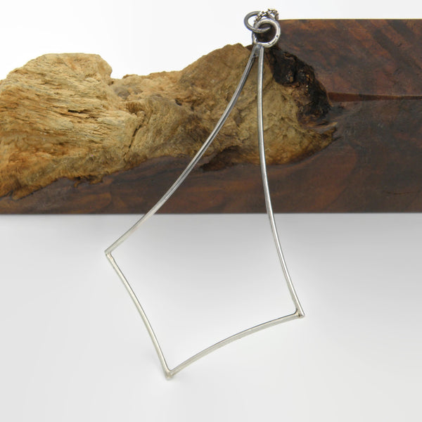 Large Negative Space Diamond Pendant