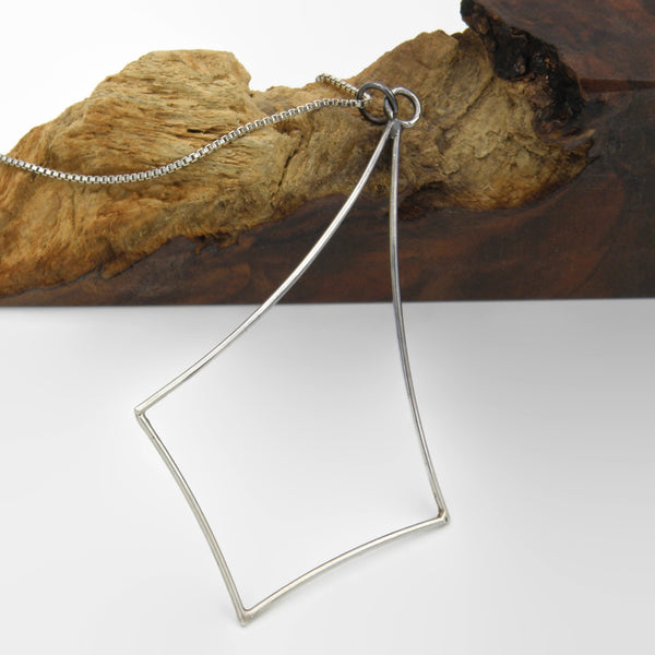 Large Negative Space Diamond Pendant