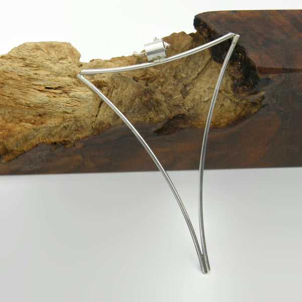 Large Negative Space Triangle Pendant