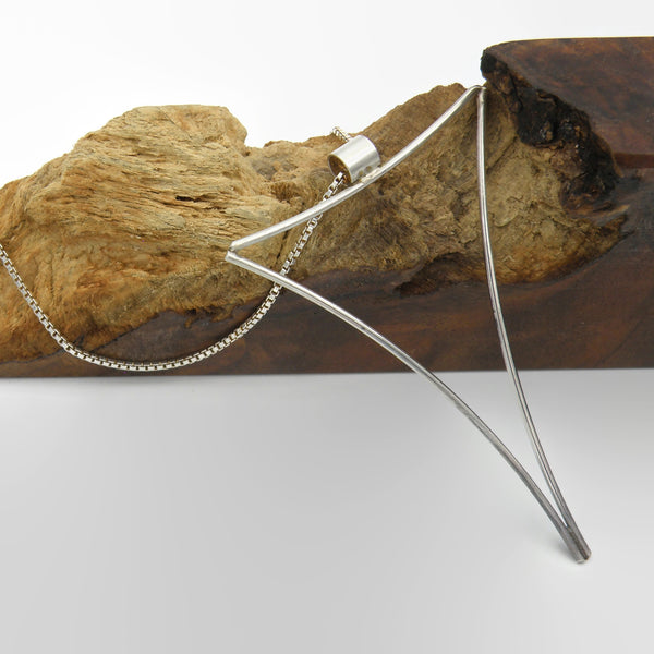 Large Negative Space Triangle Pendant